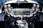 Underside view of the IPE exhaust installed on a Volkswagen Golf R Mk7.5 with quad tips