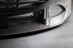 Close-up of Capristo Roma carbon bumper lower edge and mesh