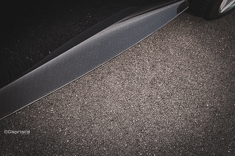 Close-up of Capristo carbon side skirt on a Ferrari Roma