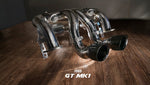 A front view of FI Exhaust Valvetronic Exhaust for Ford GT MK1 | 2005-2006 on a wooden floor