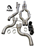 Wide shot of Active Autowerke RACE ONLY Exhaust System - GOLIATH for BMW G80/G82 M3/M4 Signature with tips with white background