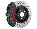 A front view of Brembo GT-S Front Big Brake Kit 380x34 Drilled Rotors for Audi S3 (8Y) with a white background