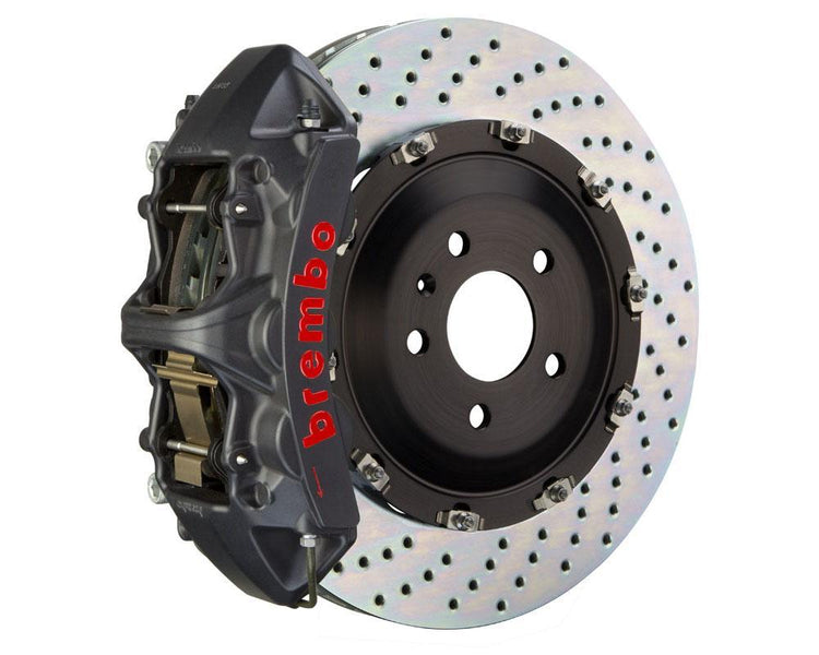 A front view of Brembo GT-S Front Big Brake Kit 380x34 Drilled Rotors for Volkswagen Tiguan R (Mk2) with a white background