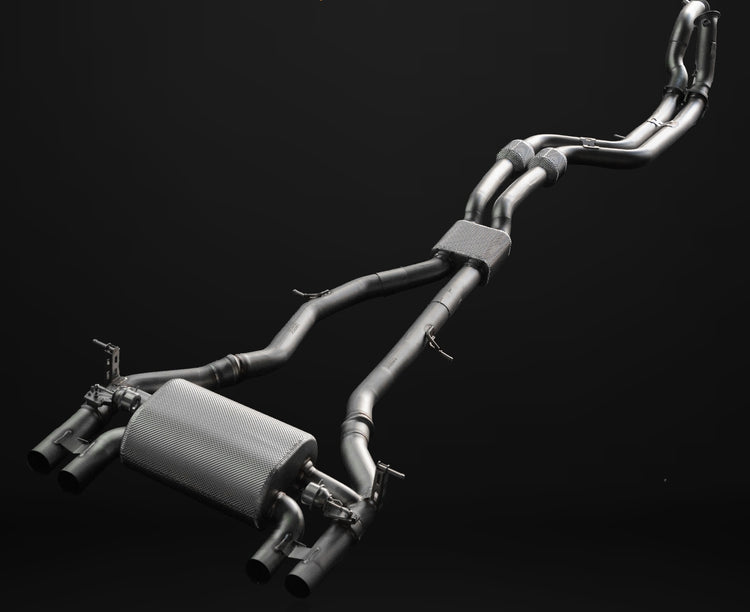 A top view of IPE SS Cat-Back Exhaust System with Remote Control for BMW M3 / M4 (F80/F82 - S55) 2014-2020 with black background