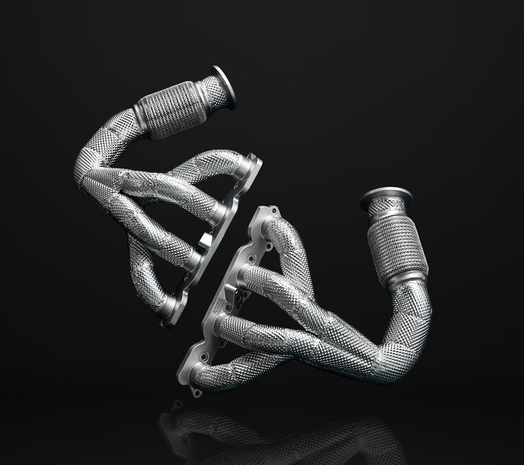 A front wide view of IPE SS header for Ferrari 458 Italia / Spider and Speciale 2010-2015 with black background