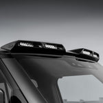 A front close up view of Urban Automotive XRS Limited Edition Carbon Quad-Pod Lazer Lightbar for Land Rover L663 Land Rover Defender 90 / 110 / 130 2020-2025 fitted on a car