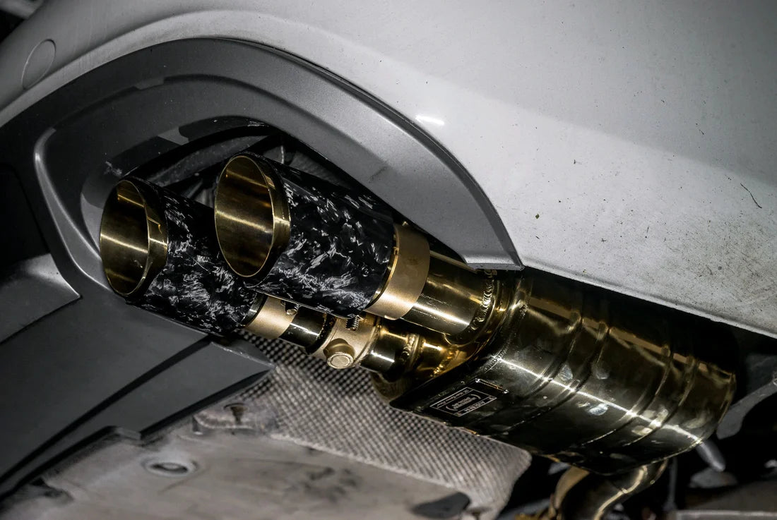 A view of Valvetronic Designs Valved Sport Exhaust System (for Audi B8 / B8.5 S4 / S5) fitted on a car. 