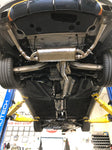 A wide view of Valvetronic Designs Valved Sport Exhaust System fitted on a car (for Mercedes CLA45).