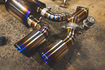 A top overview of Valvetronic Designs Valved Race Exhaust System's exhaust tips on the ground (for Porsche 991 Turbo / Turbo S).