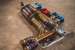 A wide view of Valvetronic Designs Valved Sport Exhaust on the ground (for BMW E46 M3).