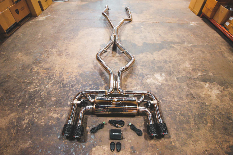 A top overview of Valvetronic Designs Valved Sport Exhaust System on the ground (for BMW X5M F85 / X6M F86).