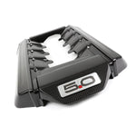 A top view of APR Performance Engine Cover Ford Mustang S550 GT 5.0 2015-2017 with white background