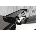 A back view of a white car fitted with APR Performance GT-250 Adjustable Wing BMW E86 Z4 2006-2008