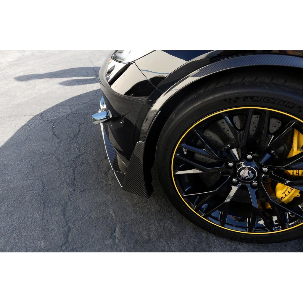 Carbon fiber front canards mounted on black Corvette bumper near wheel well, aerodynamic winglet extensions - APR Performance front canards for Chevrolet C7 Corvette Z06