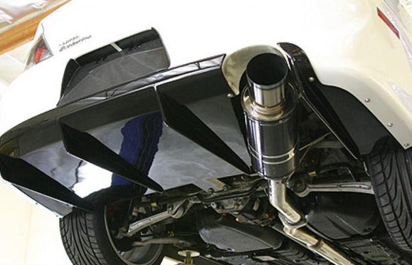 A view of the underneath of a white lifted car fitted with APR Performance Rear Diffuser Mitsubishi Evolution VIII / IX 2003-2007