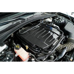 Carbon fiber engine cover with angular design pattern installed in engine bay over LT1 motor - APR Performance engine cover for Chevrolet Camaro SS LT1