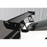 A back view of a white car fitted with APR Performance GT-250 Adjustable Wing BMW E86 Z4 2006-2008