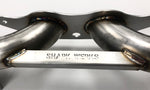 A close up view of Shark Werks Sport Exhaust for Porsche 997 / 997.2 GT3 / RS with Shark Werks logo