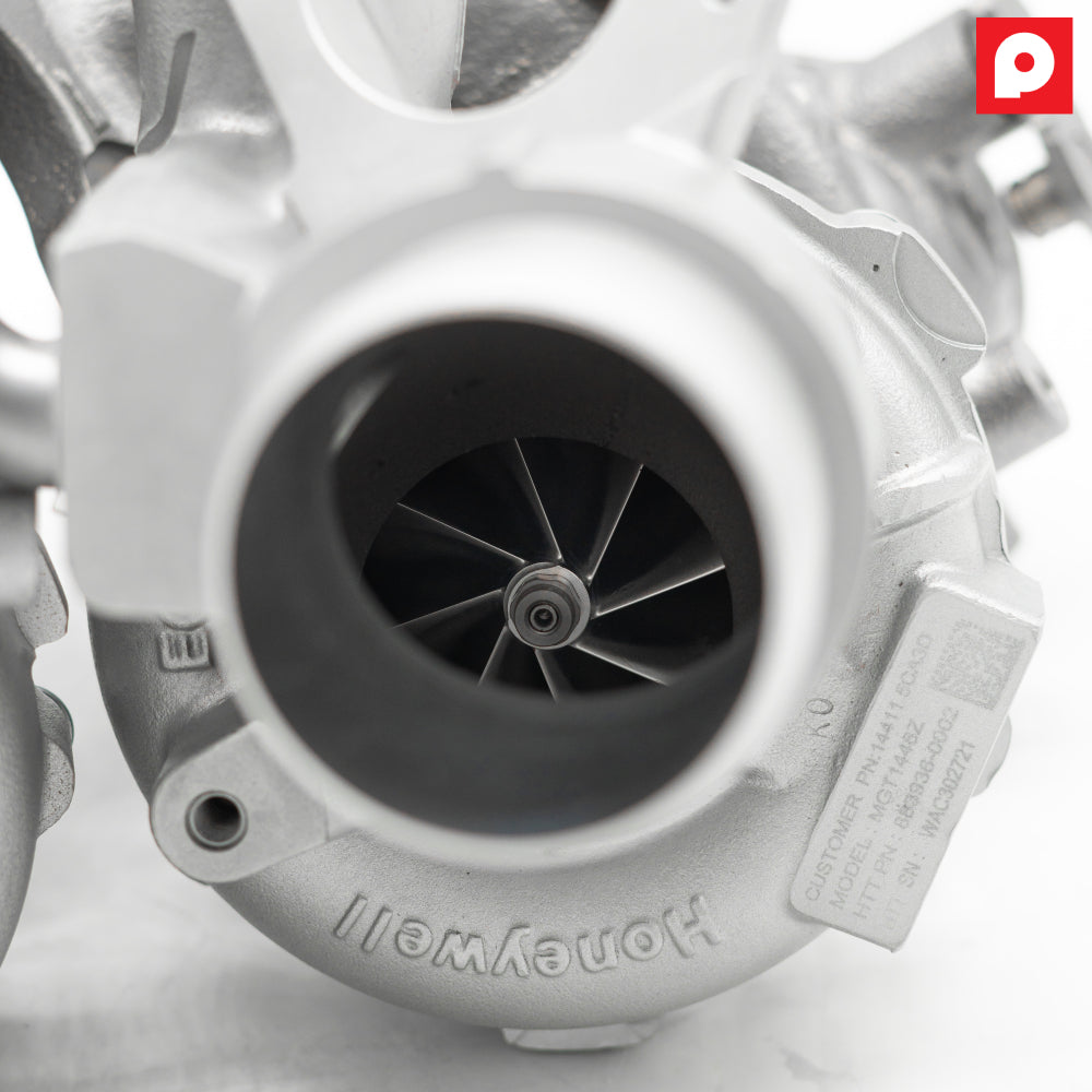 PURE Stage 2 VR30 turbo compressor inlet straight on, showing the billet wheel blade profile
