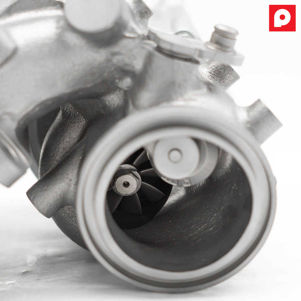 PURE Stage 2 VR30 turbo turbine housing outlet with the high-flow turbine wheel visible