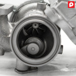 Close view of the high-flow turbine wheel inside the factory VR30 turbine housing, PURE Stage 2