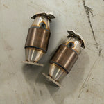 A top view of Milltek HJS Hi-Flow Sports Cats w/ No Heat Wrap for Chevrolet Corvette C8 Z06 5.5L V8 2023-2025 laying on beige titled floor