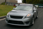 wide view of Stillen Front Fascia for Nissan Altima Sedan 2007-2009 fitted inside a car