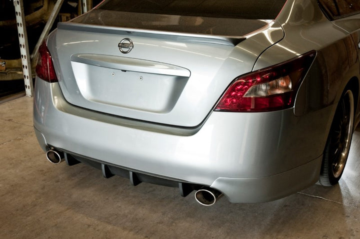 wide view of Stillen Rear Bumper Valance Diffuser for Nissan Maxima 2009-2015 fitted inside a car