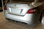 wide view of Stillen Rear Bumper Valance Diffuser for Nissan Maxima 2009-2015 fitted inside a car
