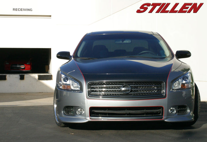 wide view of Stillen Front Bumper Lip Spoiler for Nissan Maxima 2009-2015 fitted inside a car