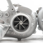 A close up view of Pure Turbos Turbo Upgrade Pure700 for Kia Stinger (3.3L) 2018-2023 with white background