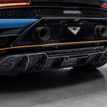 Monza diffuser and exhaust on blue Huracan, wide close-up