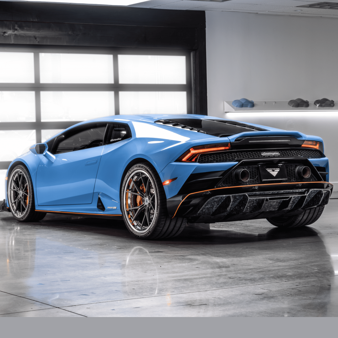 Blue Huracan EVO with Monza diffuser, showroom rear 3/4 view