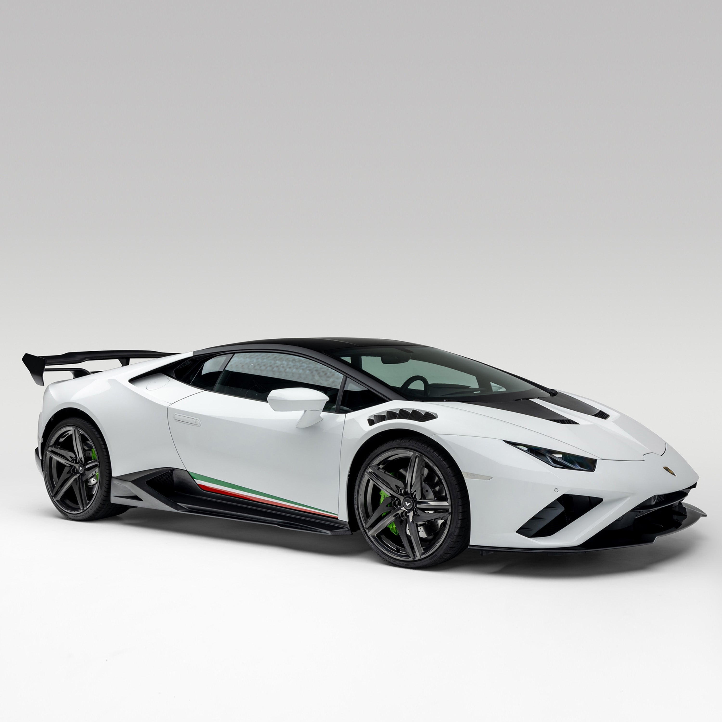 White Huracan EVO with Monza side blades, front 3/4 view