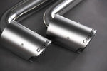 close view of Capristo Valved Exhaust with Middle Silencer Spare and Wicrom Tips (OE Actuators) for Lamborghini Urus/S 2018+ with black background