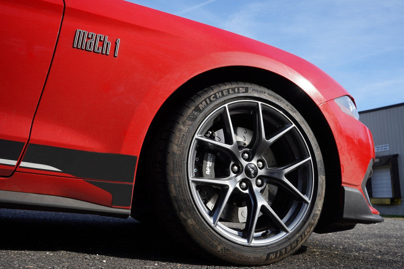 A side close up view of the Ford Mustang Mach 1 and its wheel fitted with AP Racing by Essex Radi-CAL ENP Competition Brake Kit (Front CP9660/372mm)