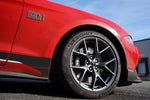A side close up view of the Ford Mustang Mach 1 and its wheel fitted with AP Racing by Essex Radi-CAL ENP Competition Brake Kit (Front CP9660/372mm)