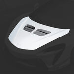 Artura GP63 hood vents on white car, dark-background close-up