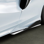 Carbon GP63 side skirt on white McLaren Artura, side 3/4 view