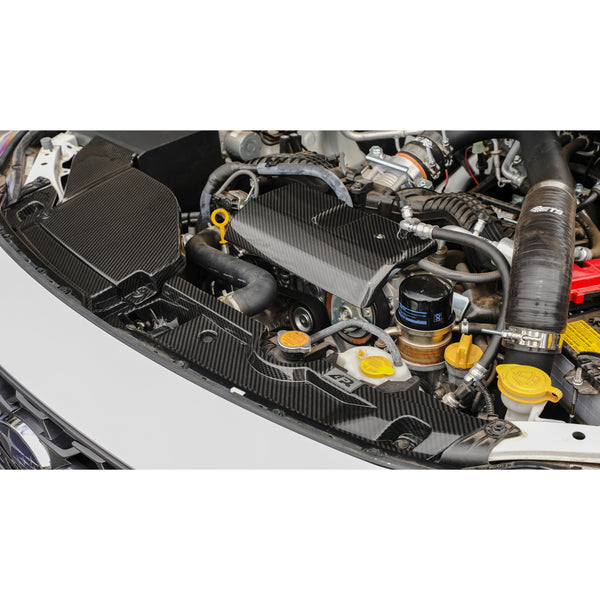 A front view of APR Performance Radiator Cooling Plate and Intake Enhancement Kit Subaru WRX 2022+ fitted in a white car