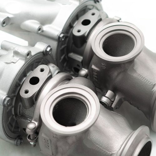 A back close up view of Pure Turbos Turbo Upgrade Pure900 for Aston Martin V8 Vantage 2018-2024 with white background