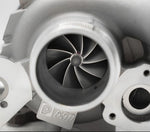 A close up view of Pure Turbos Turbo Upgrade Pure650 for Mercedes Benz (CLA45/GLA45/A45) M133 2013-2019 with white background