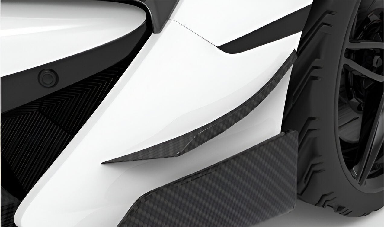 Carbon dive canards on the front bumper of a white McLaren 570S