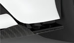 Carbon front bumper flap on a white Ferrari SF90, close-up