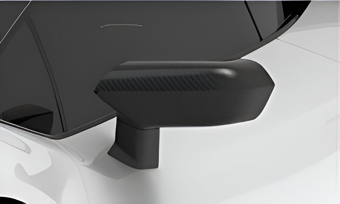 Carbon mirror cap on a white Lamborghini Huracan Evo, close-up