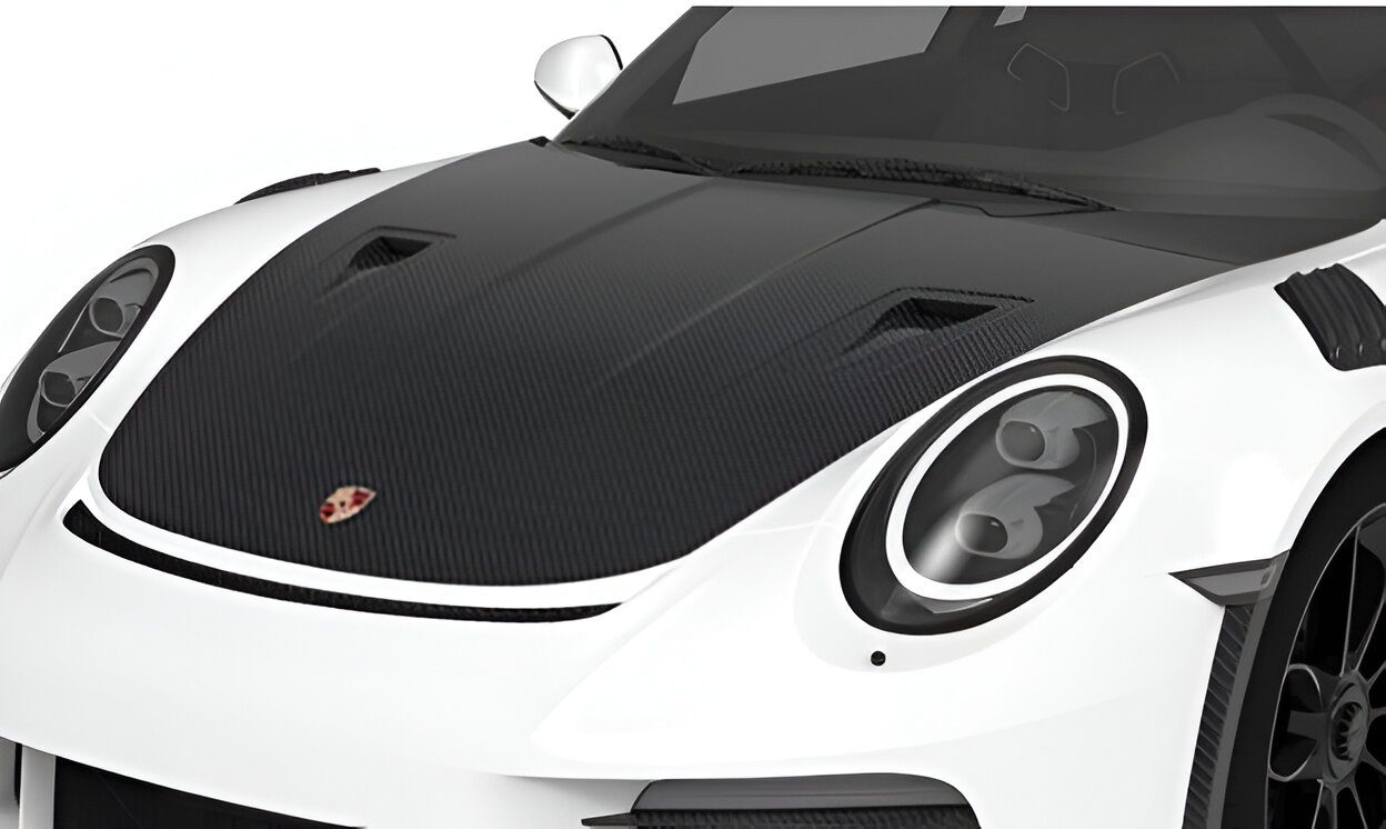 Carbon hood on a white Porsche 911 GT3 RS, front close-up