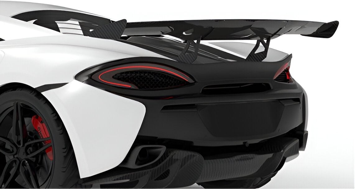Carbon race wing on a white McLaren 570S, rear close-up