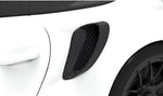 Carbon side intake on the rear quarter of a white Porsche GT2 RS