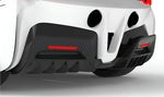 Carbon rear diffuser on a white Ferrari SF90, rear close-up