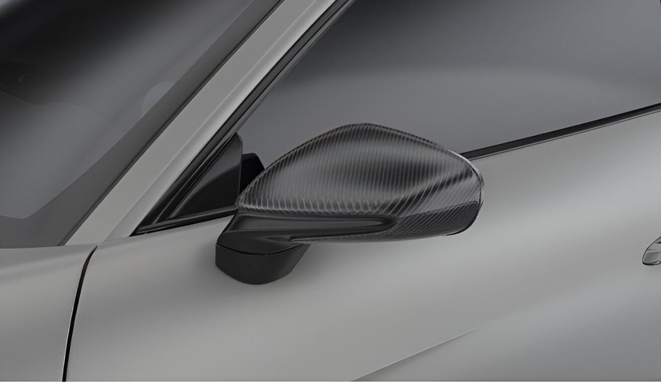 Carbon mirror cap on a grey Porsche 911 GT3 RS (992)